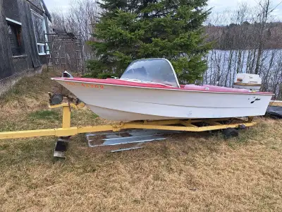 This is a used 14 ft boat with a 40 hp motor and trailer, ready for your next aquatic adventure! The...