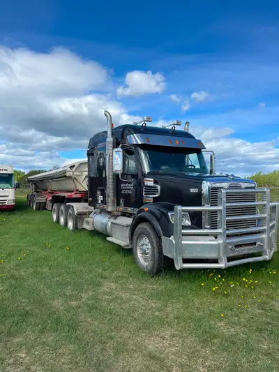 Truck and trailer combo. Good tires, fresh safety. Rigged for sidedump, walking floor, tanking. 600h...