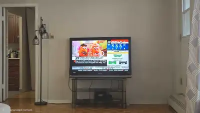  Sony Bravia TV with TV Trolley/Stand, View more