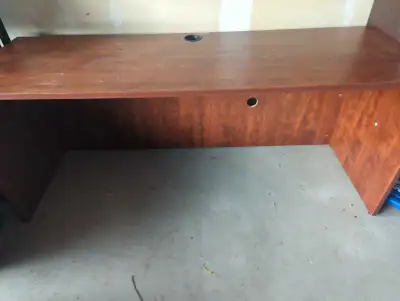 This solid wood desk, finished in a rich cherry colour, offers a spacious and professional workspace...