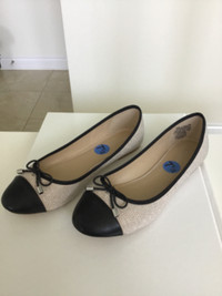 Light beige and black “ballerina” style flats