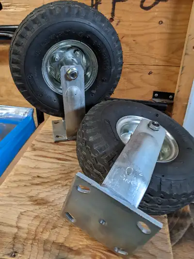 NEW , 10in dia. heavy duty flat free 4.10 x 4 - 6ply tire and wheel , with greaseable roller bearing...