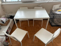 $60White dining table with 4 chairs.$60
