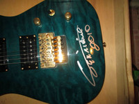 Enrique Iglesias Autographed Guitar from Private Signing