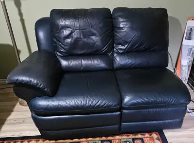 leather love seat blue $100.00, View more