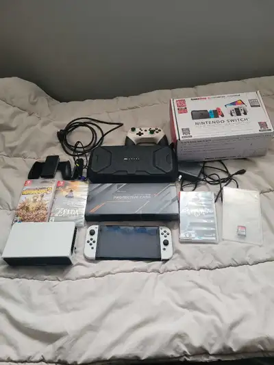 Refurbished Nintendo Switch OLED console with hdmi cord and adapter. Screen protector already applie...