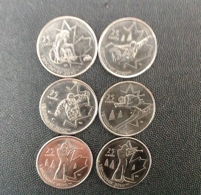 Canadian 25 cent coins for collection, fine condition.