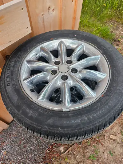 General Altimax RT, 225/55R17 with Chrysler rims. $200. set of four
