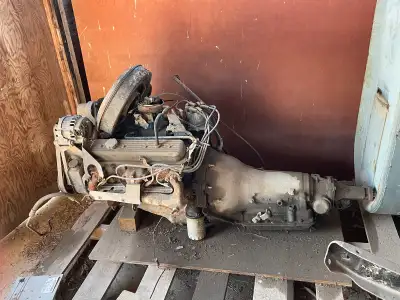 Came out of a 1990 Chevy sport. Engine ran when removed roughly 180,000 km. Trans has roughly 10,000...