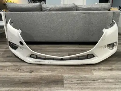 Selling a Mazda 3 OEM front bumper in Snowflake White. The bumper is in overall good condition, but...