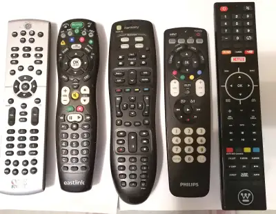 SOME TV/DVD/CBL/VCR REMOTES, THEY ARE ONEFOR ALL, HARMONY, NETFLEX, EASTLINK, PHILIPS, ONEFOR ALL, H...
