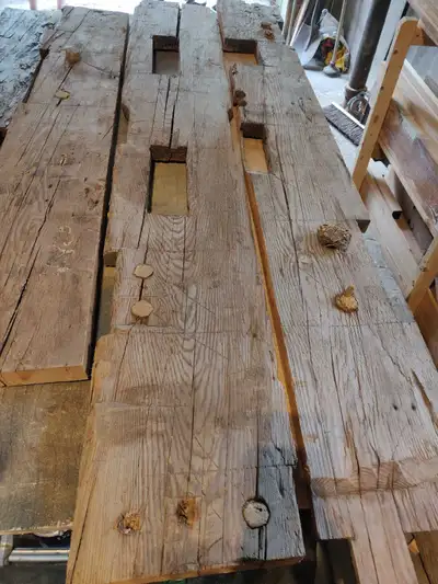 Amazing selection of reclaimed slabs cut from turn of the century barn beams. The Douglas fir beams...
