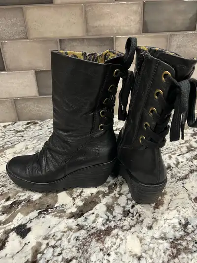 Women’s 8.5 Fly London leather boots, View more