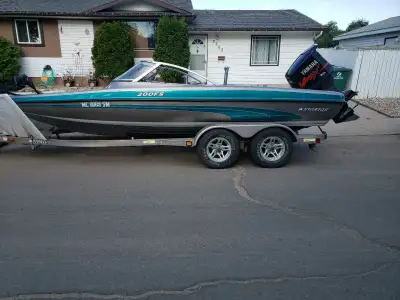 2003 200 f/s stratos with 2003 225 Yamaha n trolling motor fish finder 2 live wells big built in coo...