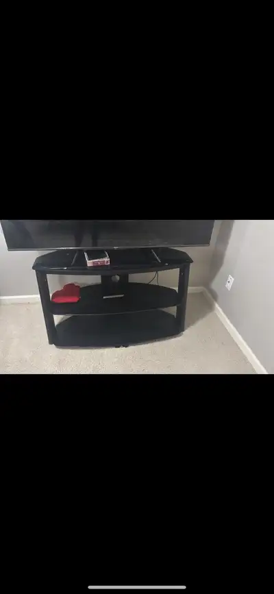 Free glass table. I was using it for my 65 inch tv