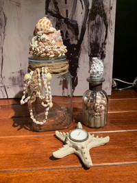 Beach decor jars shells and candle