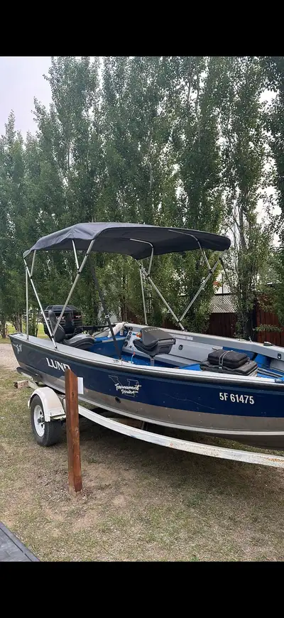 2 stroke 75HP Mercury with tilt/trim. Everything works and runs as it should. Needs nothing to get o...