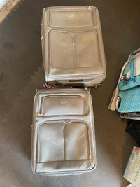 2 delsey suitcases 