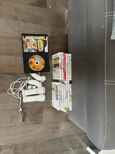 $200 OBO This lot includes classics such as Super Mario Bros, Mario Kart, and Wii Fit, offering a va...