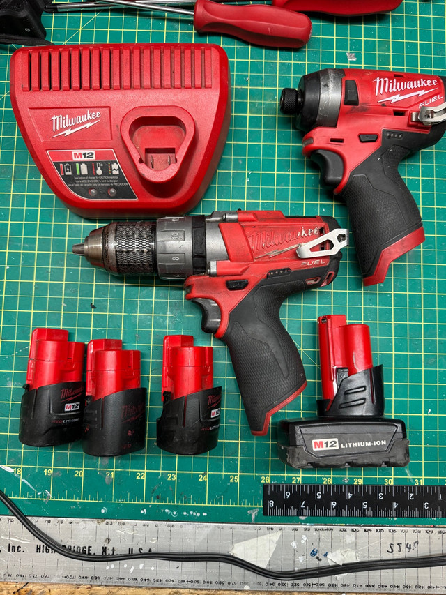 Milwaukee m12 Fuel impact,drill 4 batteries and charger.  in Power Tools in Winnipeg