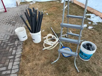 12' diameter pool and accessories. The pool is old but all the accessories are in good shape. Ladder...