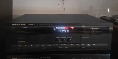 This is a used Harman Kardon DC5300 dual cassette deck, perfect for audiophiles and vintage audio en...