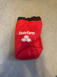 Red and black state farm travel pouch 