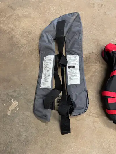 Auto matic life jacket and two regulars