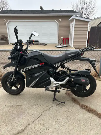 Selling my 50cc Scorpion Stinger scooter in like-new condition. This bike is super clean — no scratc...