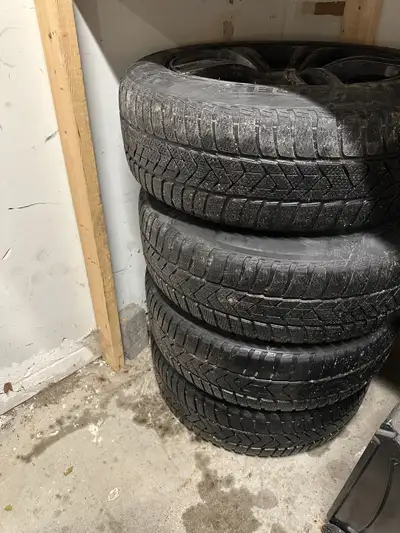 Great condition! Set of 4 snow tires mounted on rims, ready to install. Excellent for safe and relia...