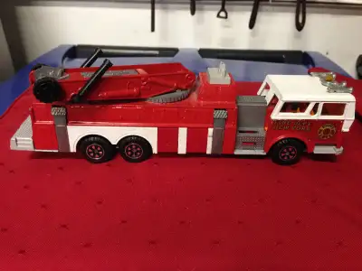 PARKER PICKERS - This toy fire truck is made in France by Majorette. It is 9.5 inches long and appea...