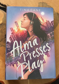 Alma presses play by  tine cane