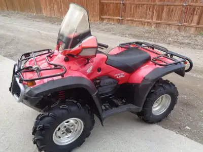 Selling a 2007 Honda Rubicon that includes a winch (rope), windshield, rear bumper. front end has ne...