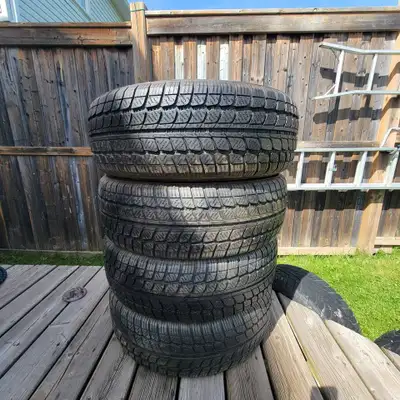 A set of 4 Ironman snow tires 80% tread 8/32 bought for my car but there a little to big. 300 obo