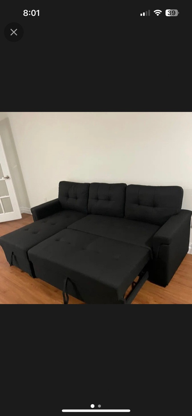 Free delivery- black sectional couch with pullout bed - storage in Multi-item in Edmonton
