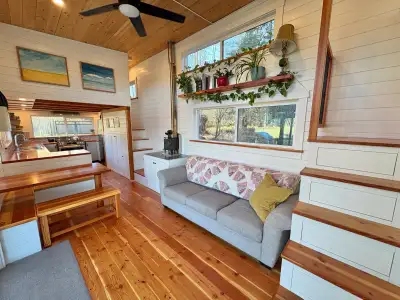 Located in Merville, BC. This tiny house on wheels is family- tested for full-time living: it has co...
