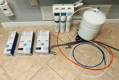 With used as well as Brand New replacement filters, water tap and lines. Was used in a small office...