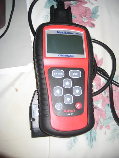 A few tools that I no longer use * Original OBD II scanner tool with original case, CDrom and USB ca...