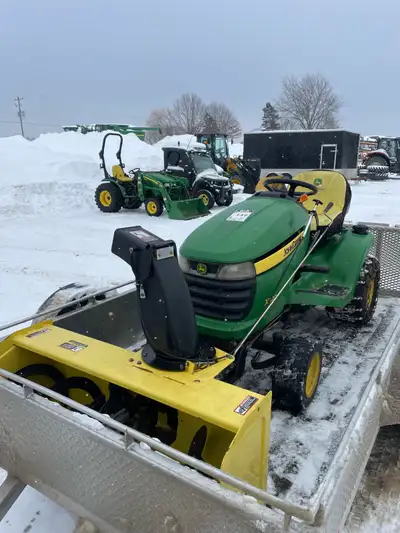 John Deer X320 with mower and blower , View more