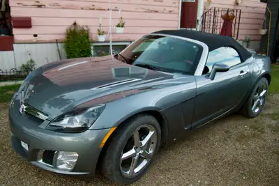The 2007 Saturn Sky Red Line is a high-performance, two-seater convertible built on the GM Kappa pla...