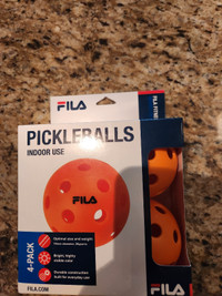 New, 4 pack FILA pickleballs for indoor use