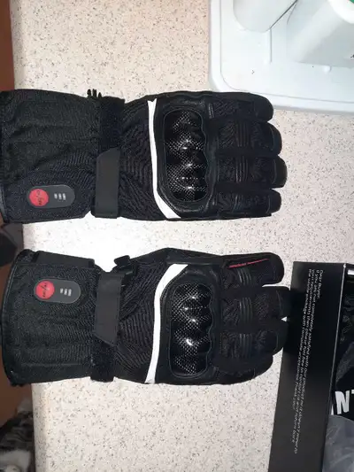 Heated motorcycle gloves. Bought last fall and I've only worn them once but they are too big. They w...