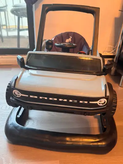 Baby Activity Centre - Ford Bronco. Makes car noises when different buttons are pushed. Car horn to...