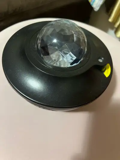 Transform any room into a mesmerizing galaxy with this used galaxy projector. This compact device pr...