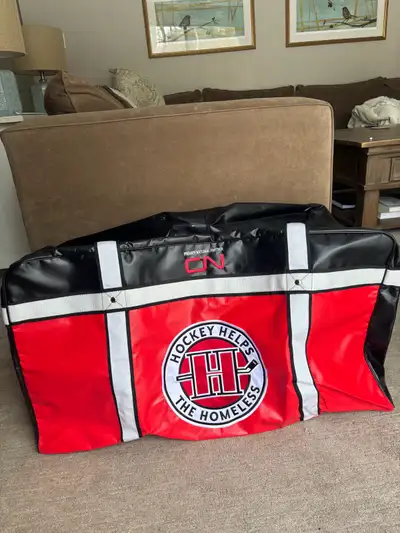 Brand new, never used hockey bag. Won at a tournament by Hockey Helps the Homeless but didn’t need t...