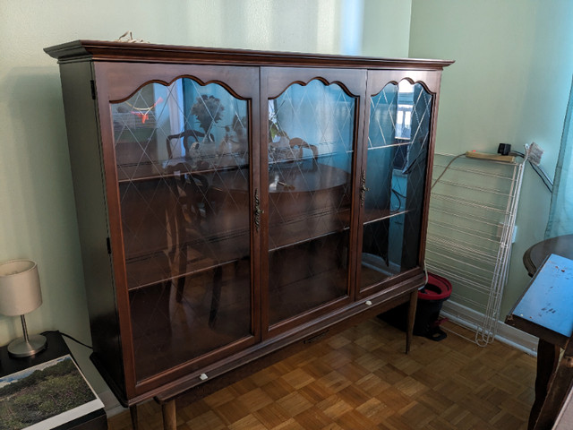Wooden cabinet with glass doors in Hutches & Display Cabinets in City of Toronto