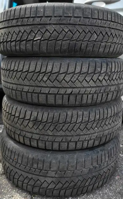 WINTER TIRES $265 4 CONTINENTAL APPROXIMATE 50% USED 215 65 17
