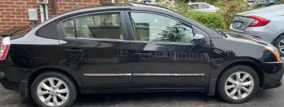 Selling a gently used 2011 Nissan Sentra in very good condition with under 35,000 KM on the odometer...