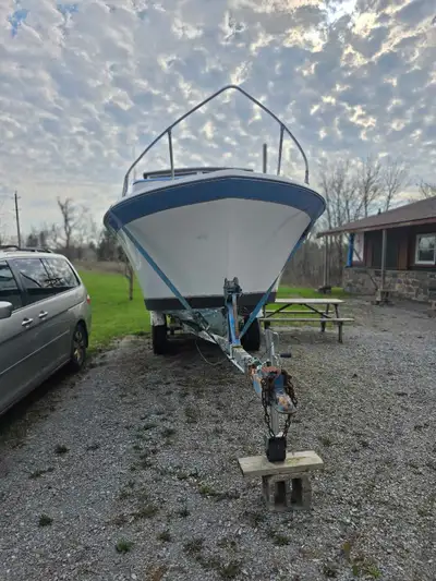 1972 wilker 21 ft no leaks , motor was winterized, have everything to put it back together, new tire...