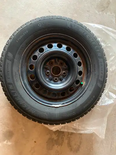 Michelin X-Ice Snow winter tires 215/65R16 102T Selling with rim. (Tires are on Rims) Lots of life l...
